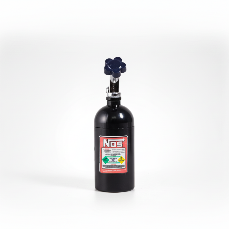 Black nitrous oxide system bottle with red label on a white background