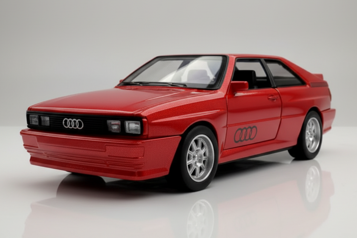 Blue Audi car model on a reflective surface with a black and yellow striped background