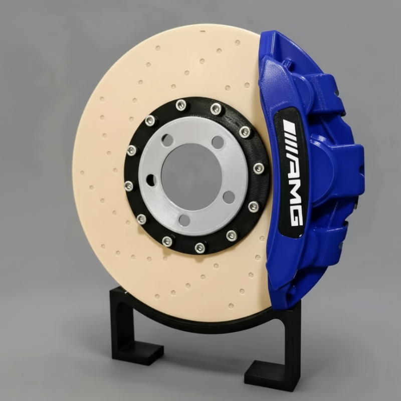Car brake disc with blue caliper on a gray background