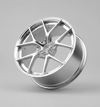 silver bbs ri-s car wheel rim held in a hand with green foliage in the background