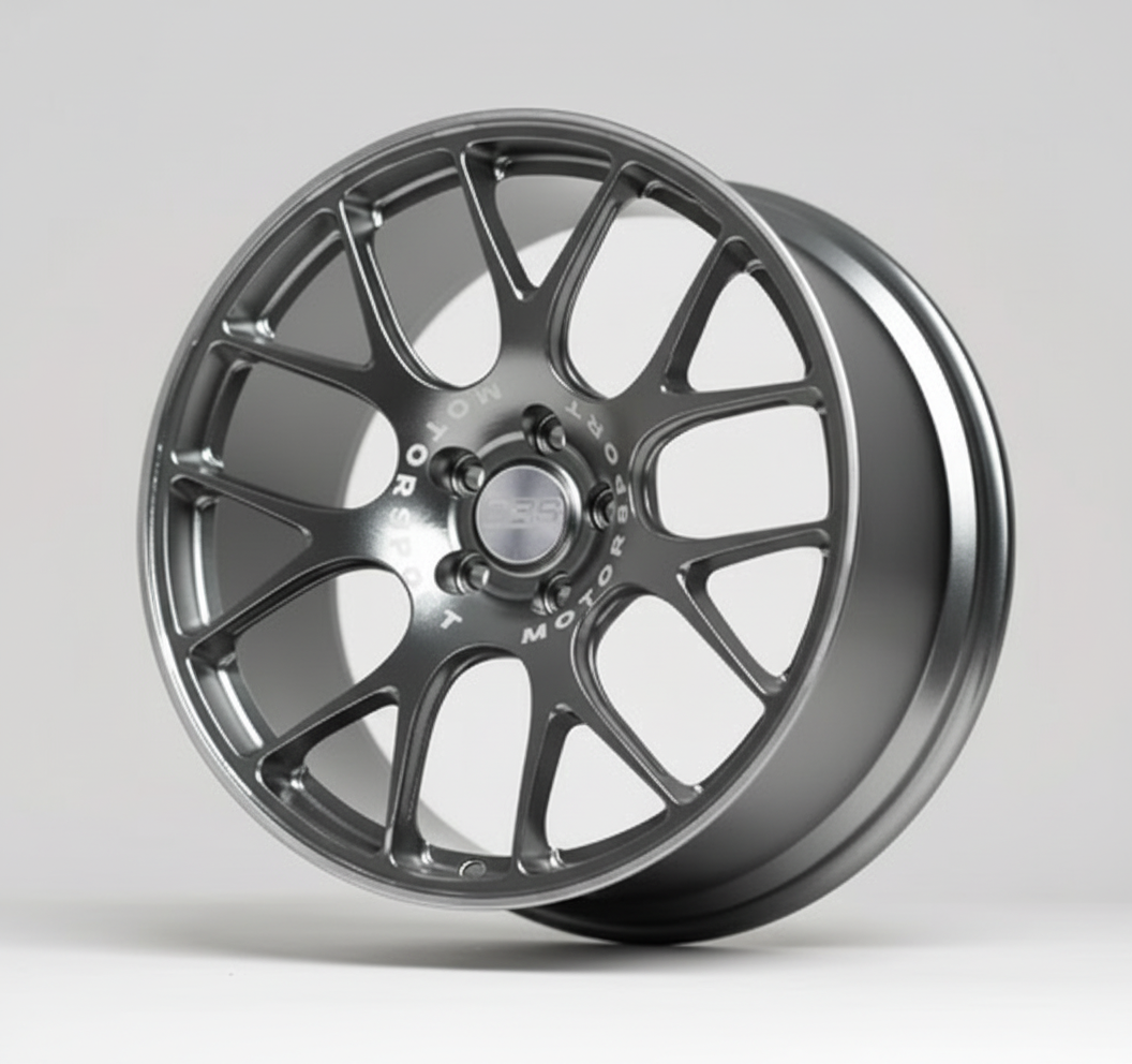 Car wheel rim on a stand with a white background