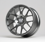 Car wheel rim on a stand with a white background